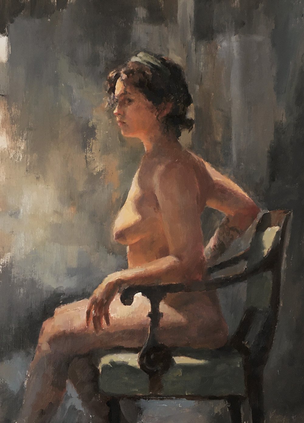 Life painting of a woman sitting in a chair