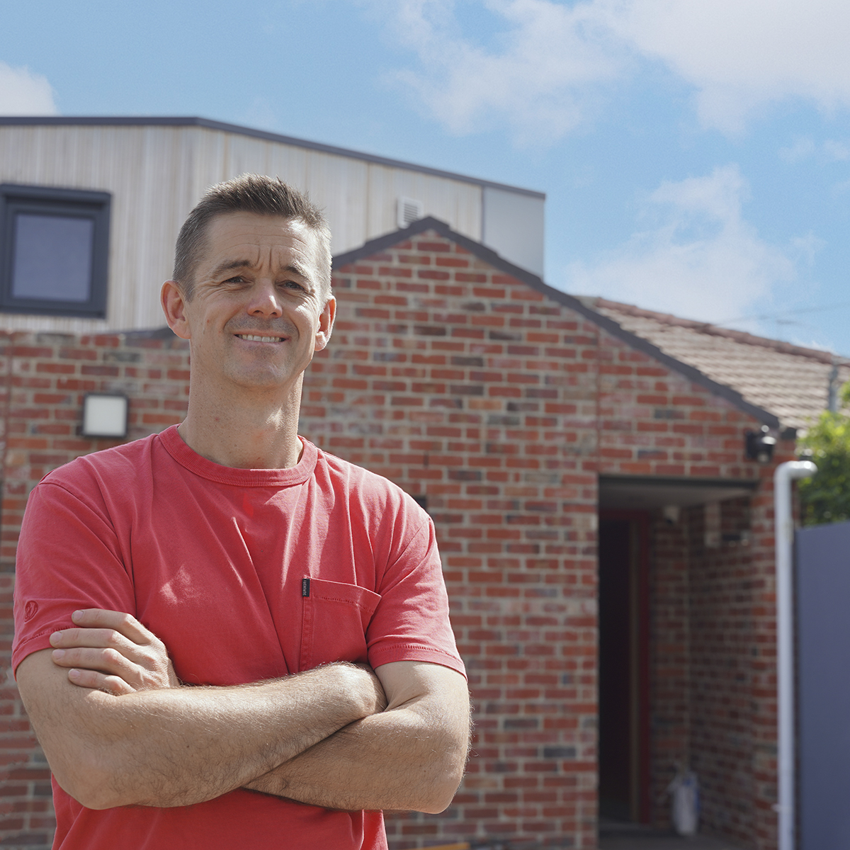 Jonathan infront of his Caulfield South sustainable home