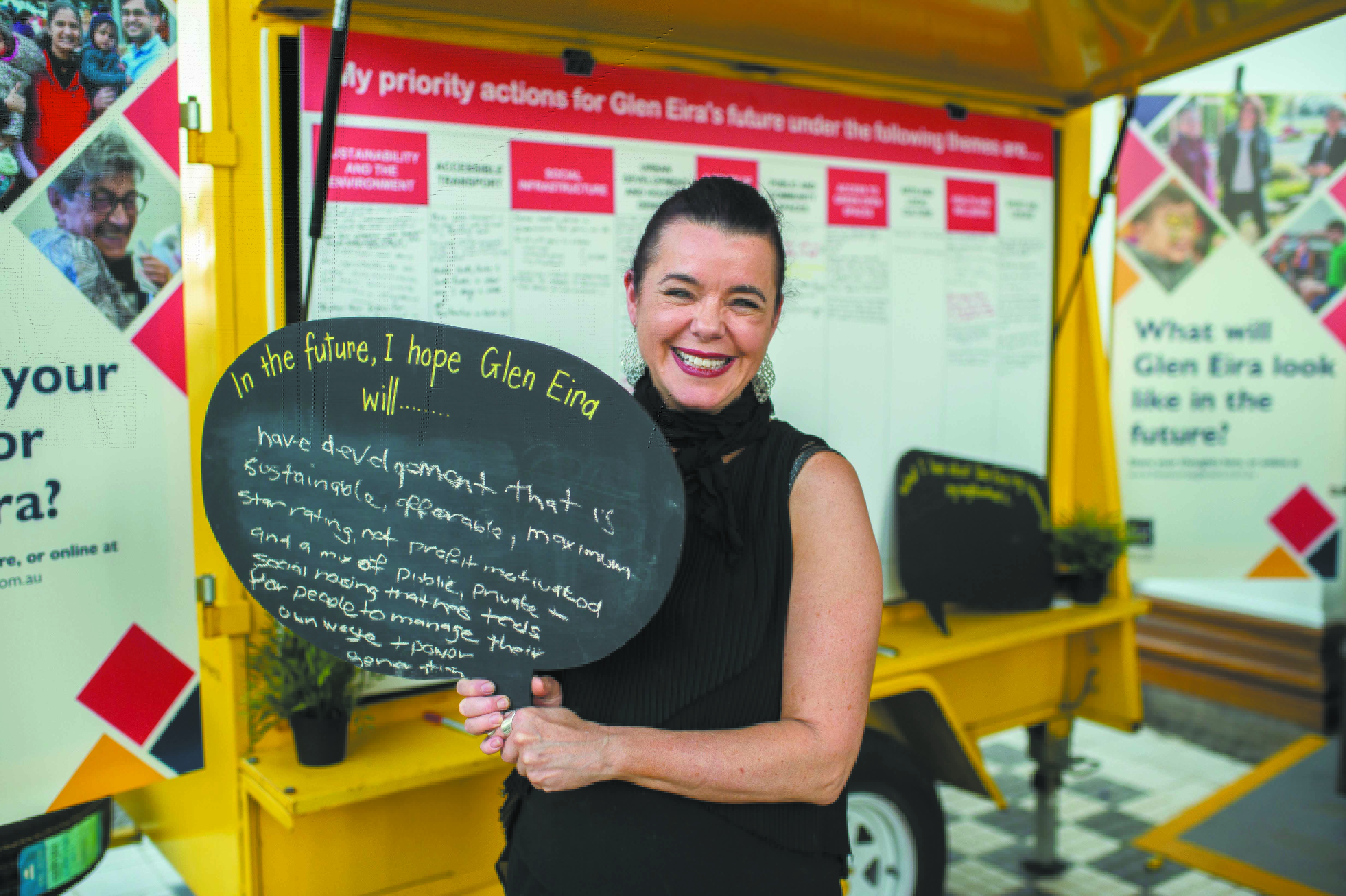 Lady holding a 'glen eira future' sign