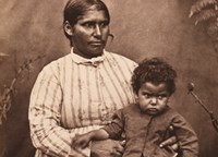 Louisa Briggs pictured holding child