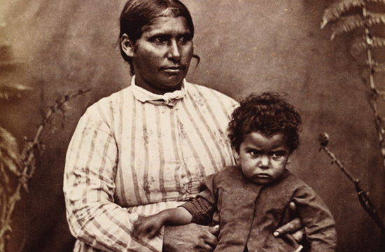 Louisa Briggs pictured holding child