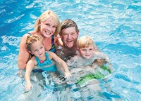 Family in a swimming pool