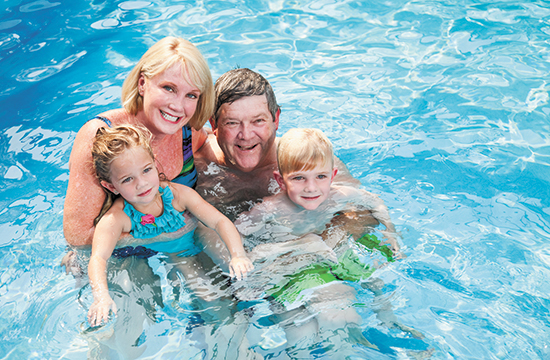 Family in a swimming pool
