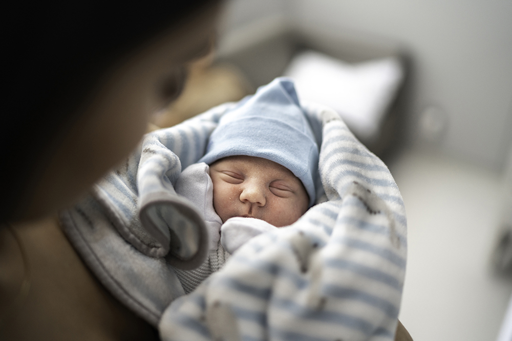 Woman holding a baby