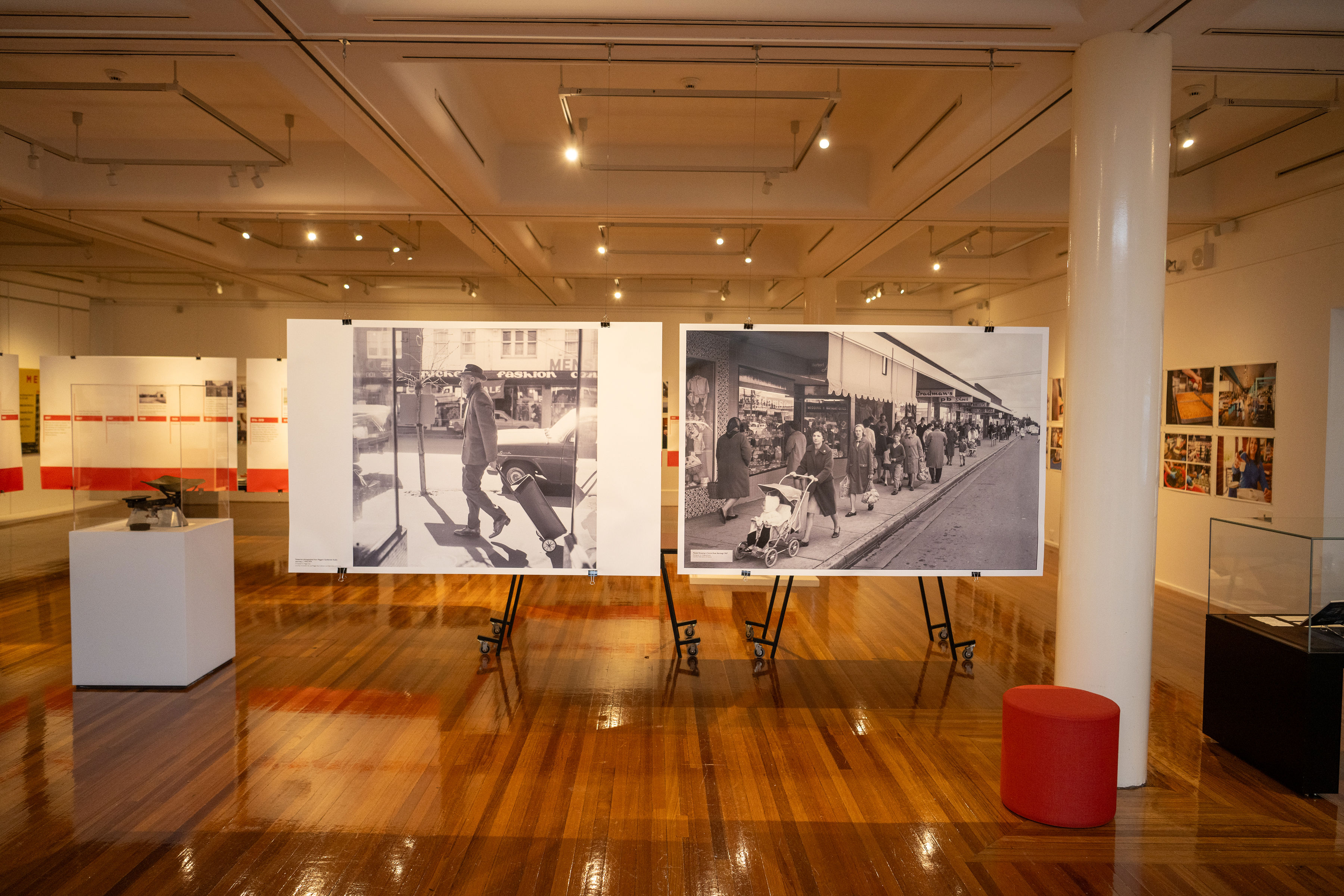 Two black and white photos in museum