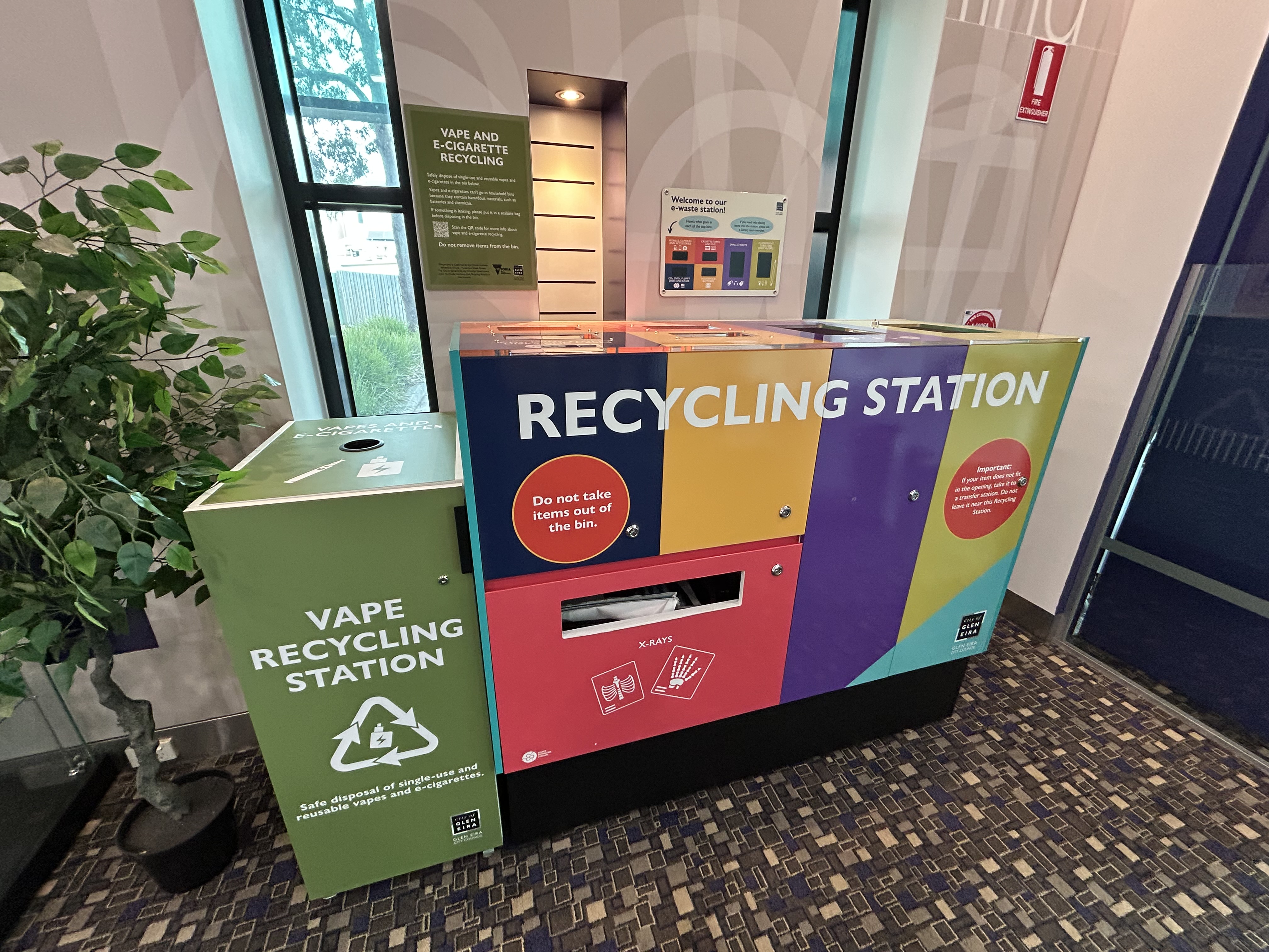 Photo of vape recycling station next to e-waste recycling station at Carnegie Library and Community Centre