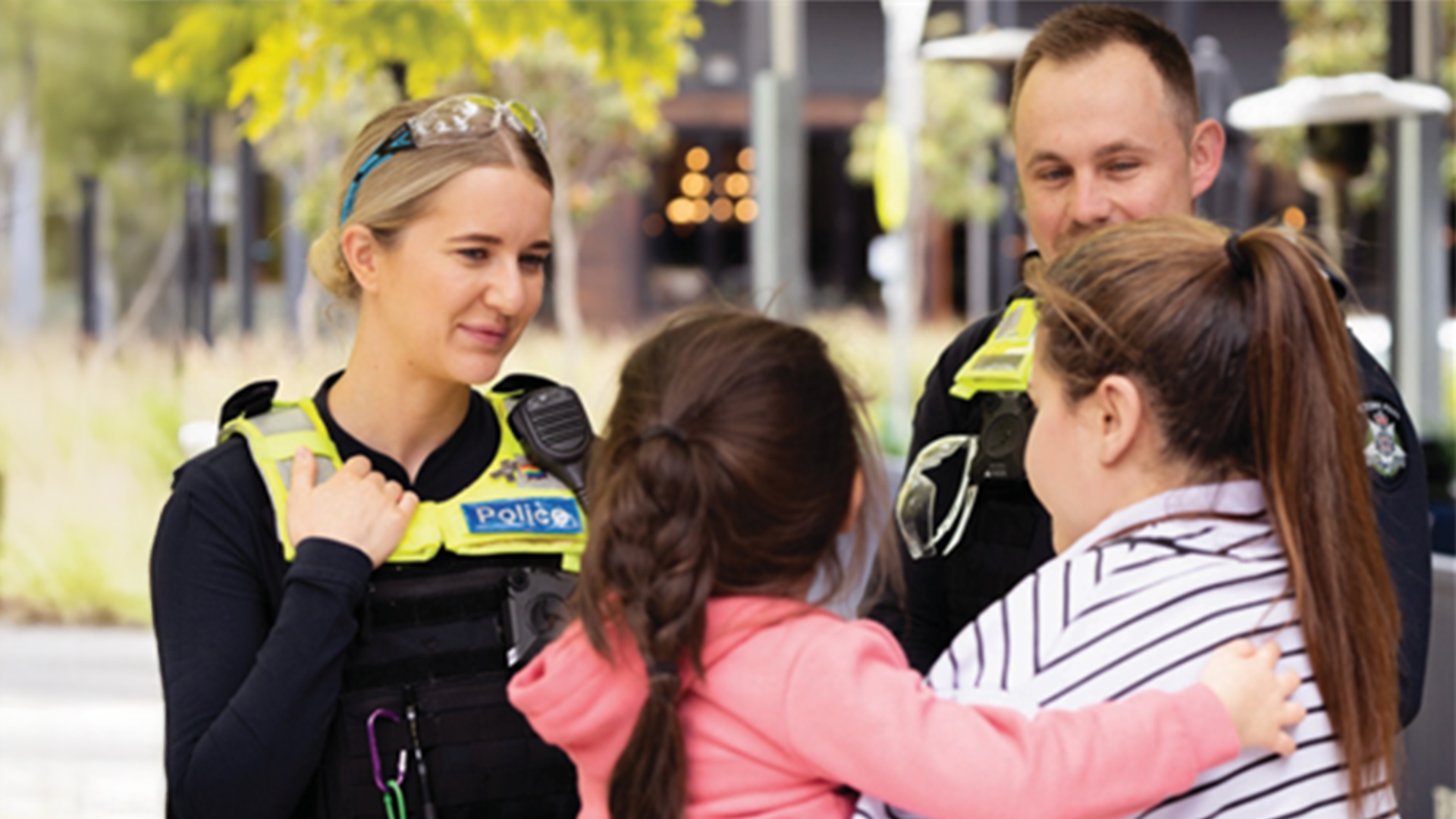 Victoria Police with a community members