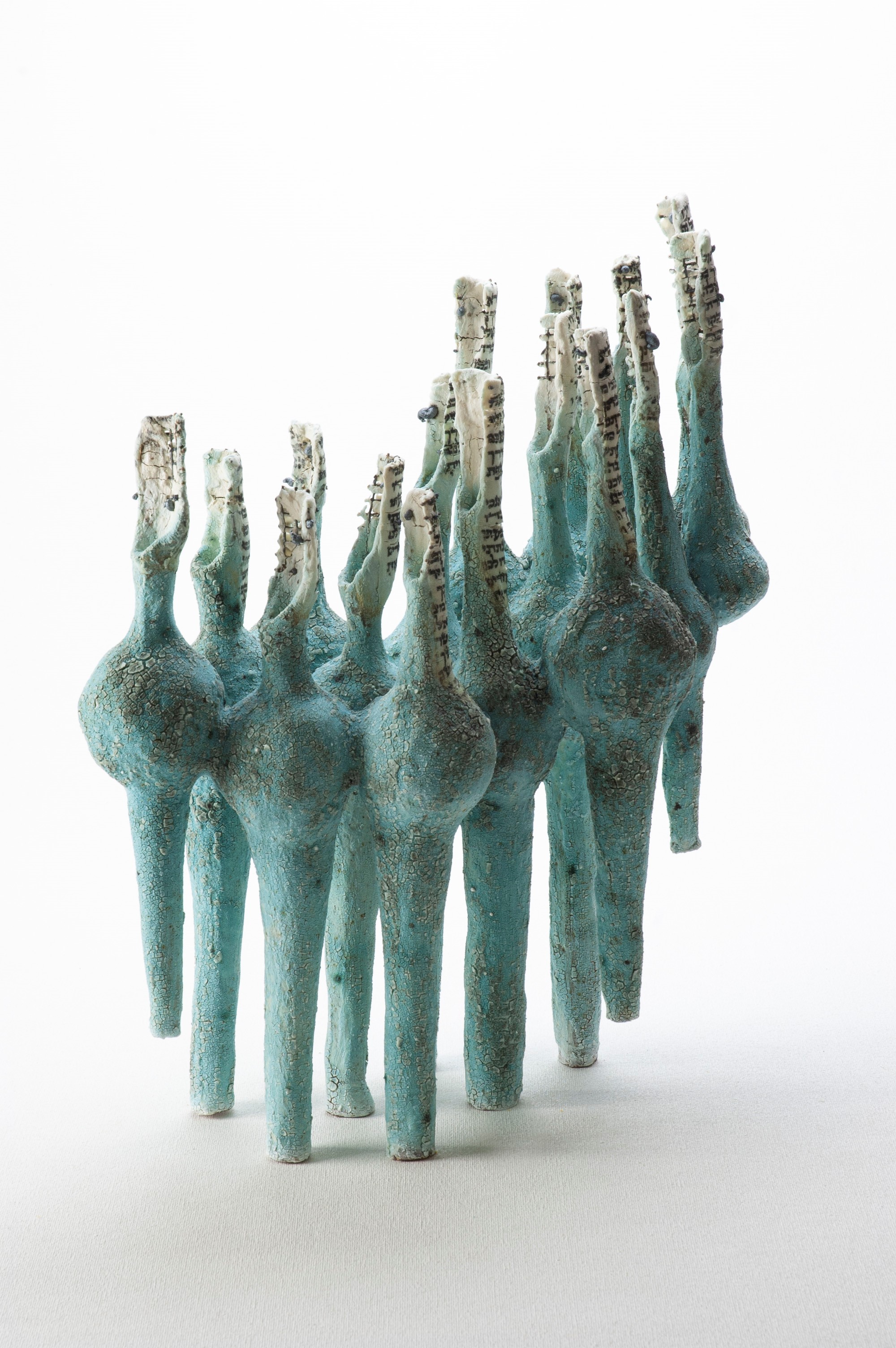 Abstract clay sculpture, green tubes