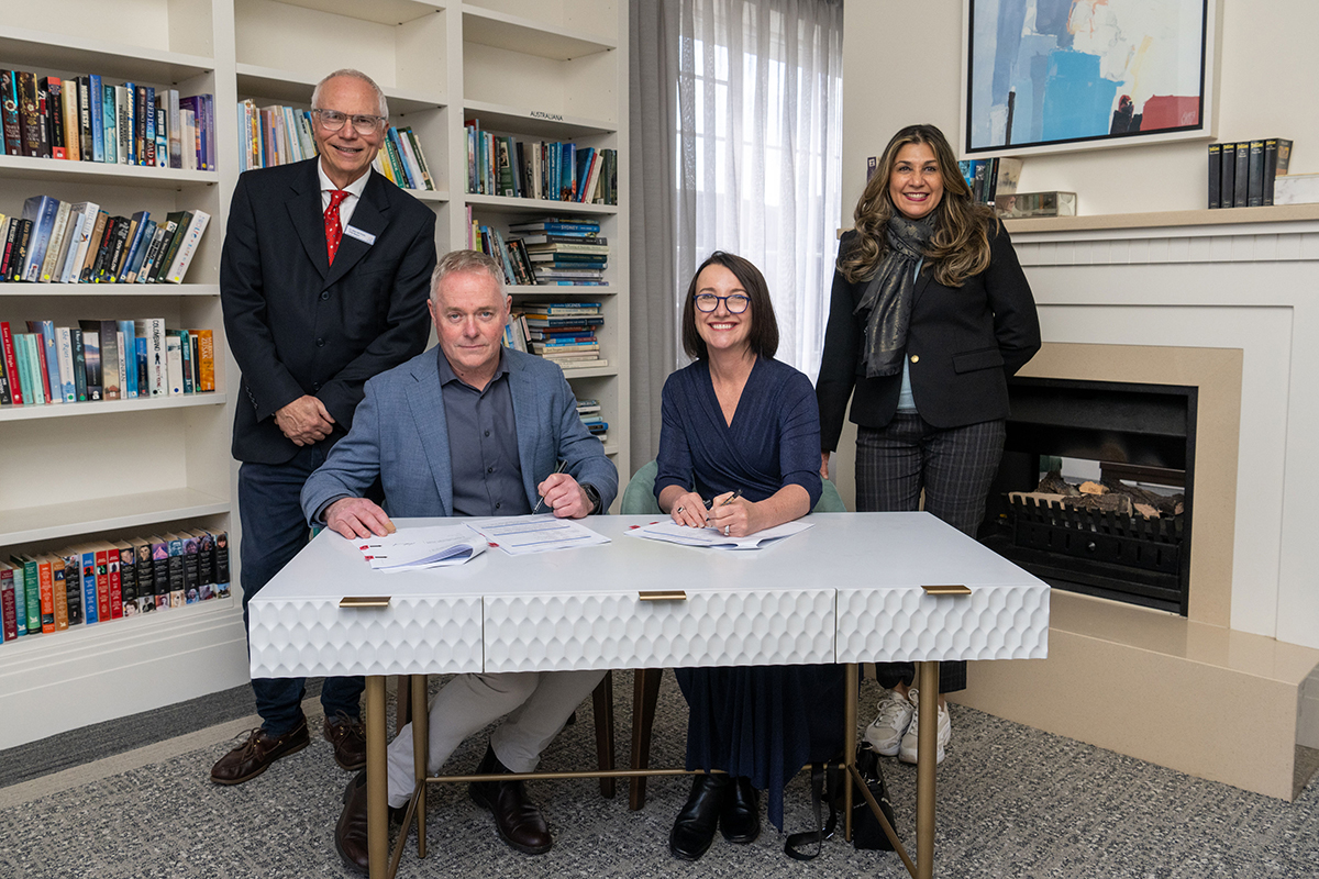 Bayside Deputy Mayor Alex del Porto, Bayside City Council CEO Mick Cummins, Glen Eira City Council CEO Rebecca McKenzie and Glen Eira Mayor Anne-Marie Cade formalising the agreement.