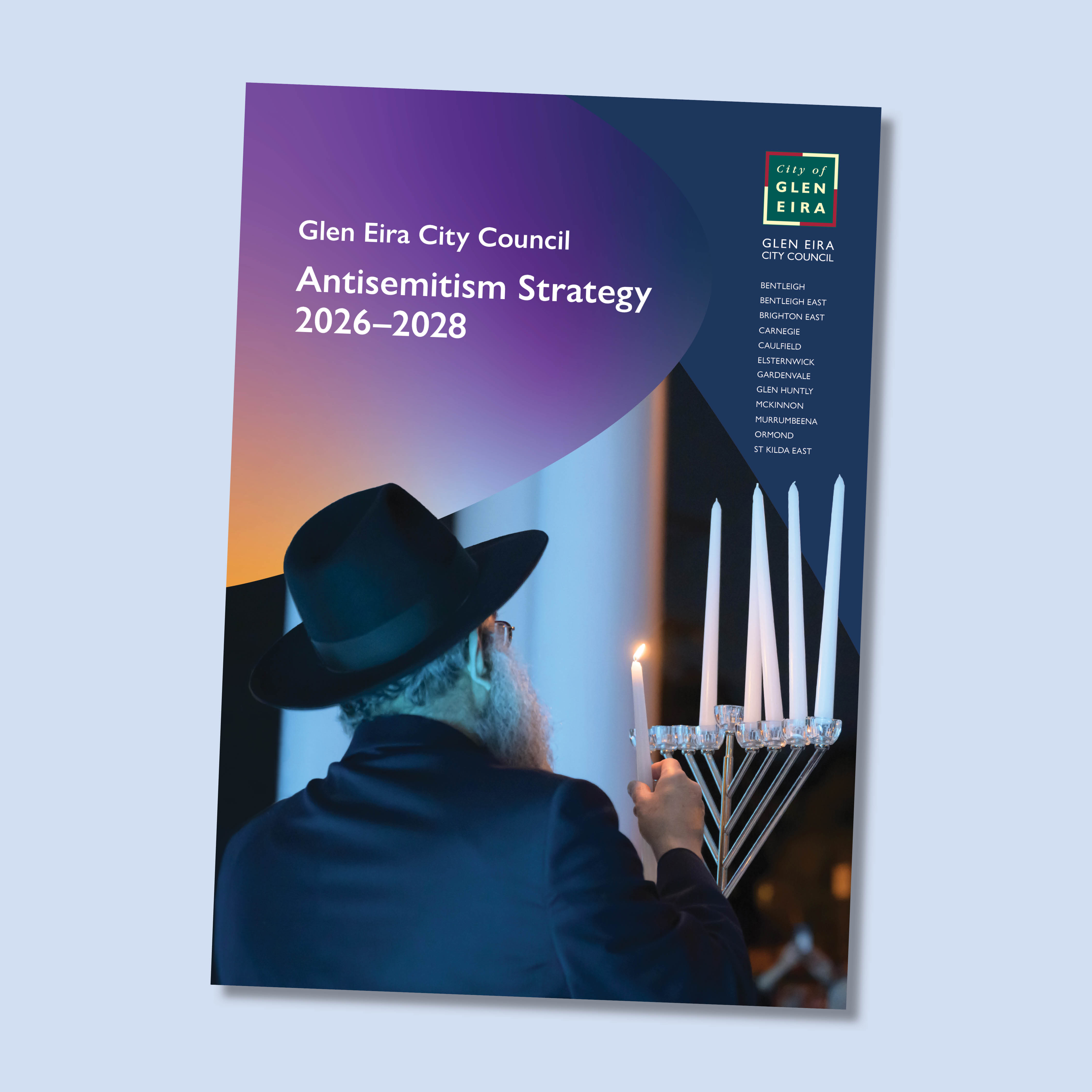 Cover of Glen Eira City Council’s Antisemitism Strategy 2026–2028, showing a person lighting a candle beside a menorah.