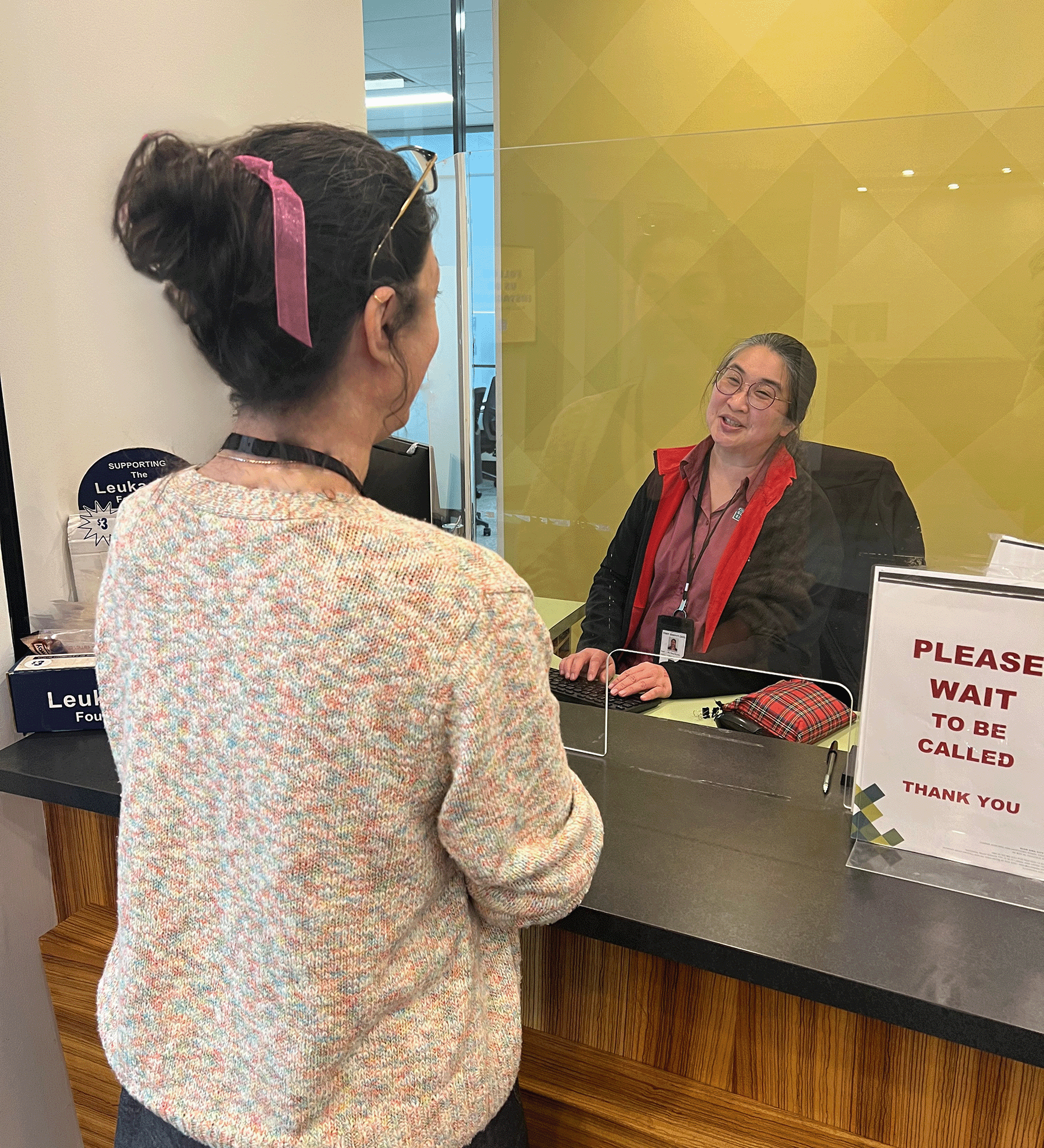 Person being served at service centre