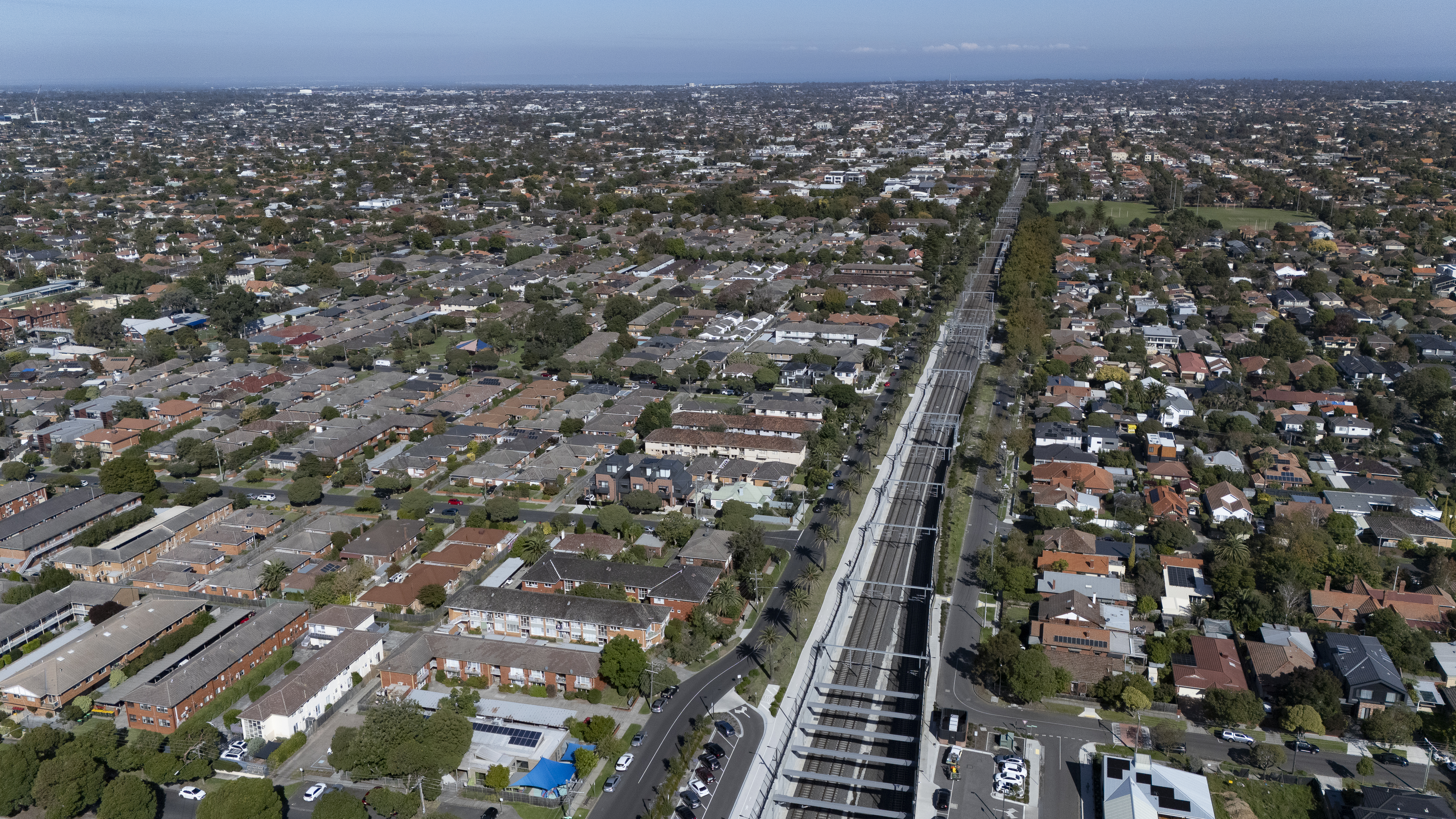 Aerial view of Glen Eira, looking over houses and the train line.